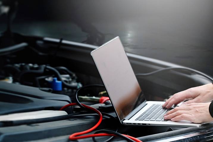 Mechanic performing a car diagnosis