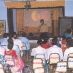 Discussion on the common eye diseases for community volunteers: mostly teachers, traditional healers and senior students. An ICEH slide set is being used. Vivekananda Mission Asram, West Bengal, India