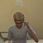 A Sim experiencing a headache, indicated by a red aura around their head.