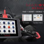 Autel Maxisys MS906 diagnostic tool displaying vehicle information on its screen